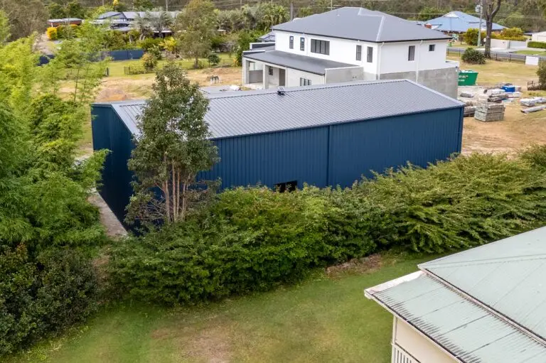 Aerial view of workshop shed in Forestdale with Deep Ocean walls and Monument roof