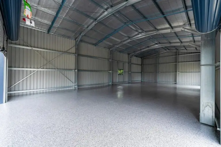 Interior of epoxy floor workshop shed in Forestdale with cookies-and-cream non-slip coating